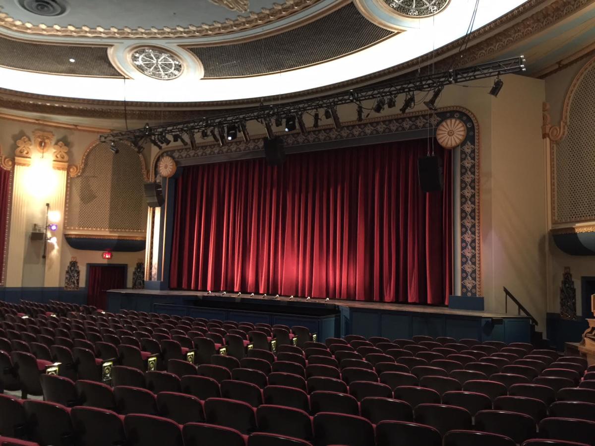 The red curtain on stage at The Civic Theatre of Allentown in Allentown, Pa.