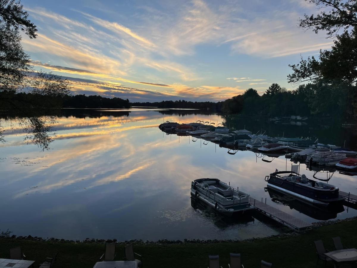Pontoons and boats on the dock at Lake Wissota in Chippewa Falls