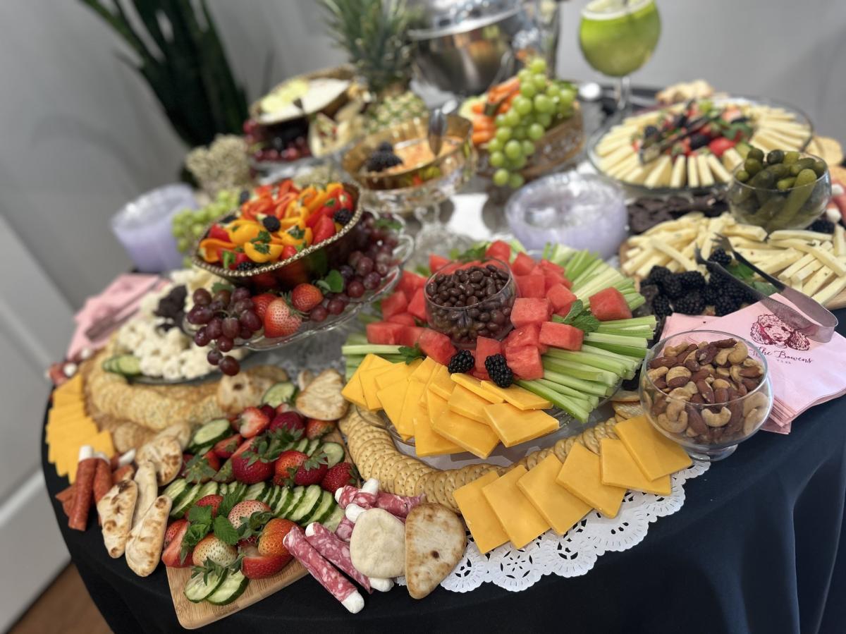 a charcuterie display of food from back home catering