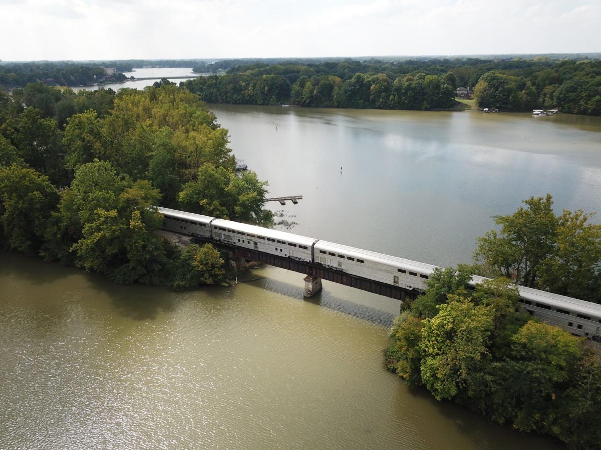 The Nickel Plate Express passing over a bridge on the Morse Reservoir in Hamilton County