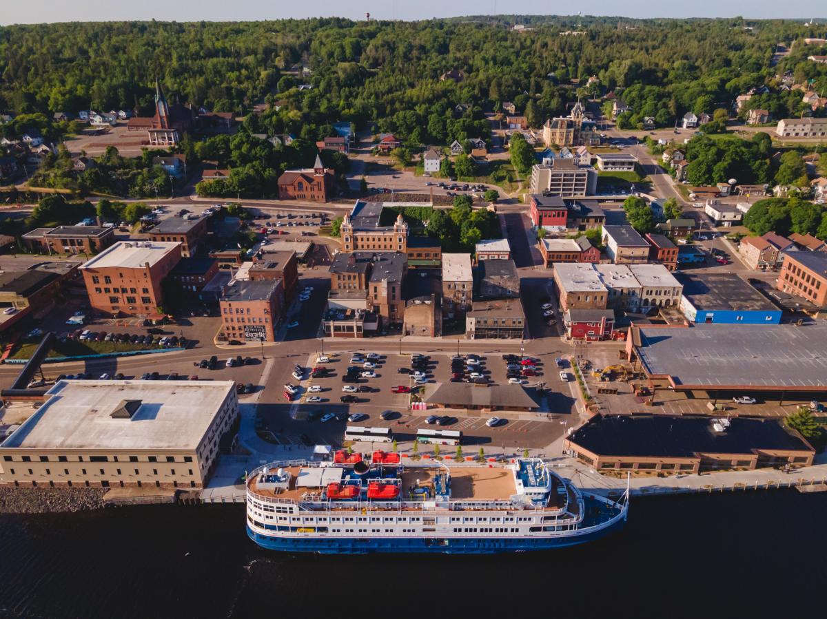 Cruise ship docks in downtown Houghton