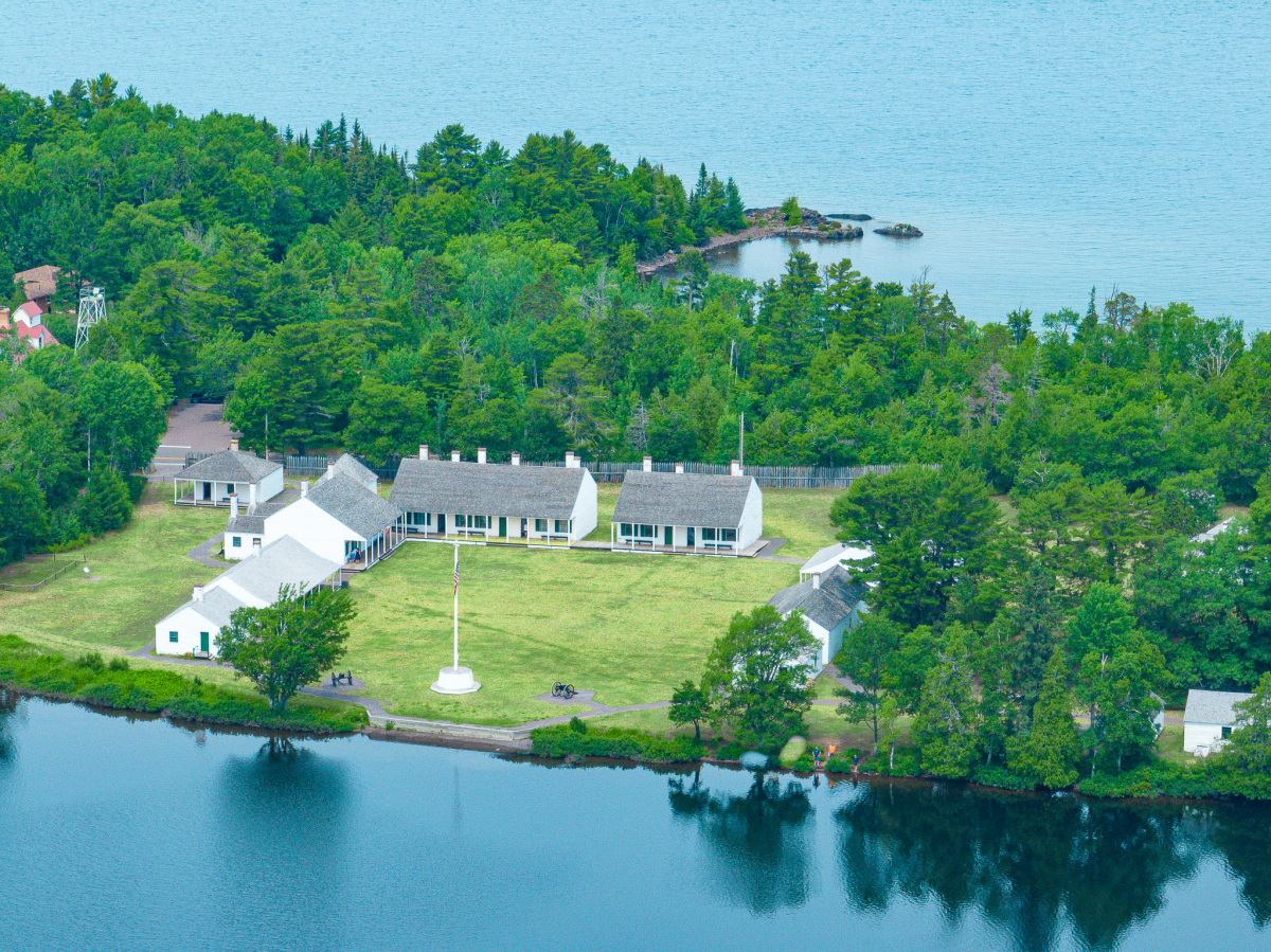 Aerial view of Fort Wilkins State Park showing buildings and Lake Superior