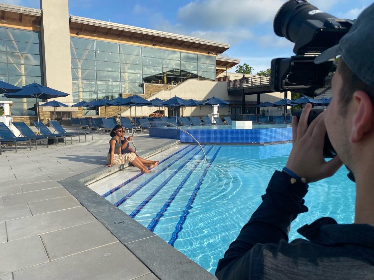 A camera crew films Lauren and Laurita Portee at Nemacolin