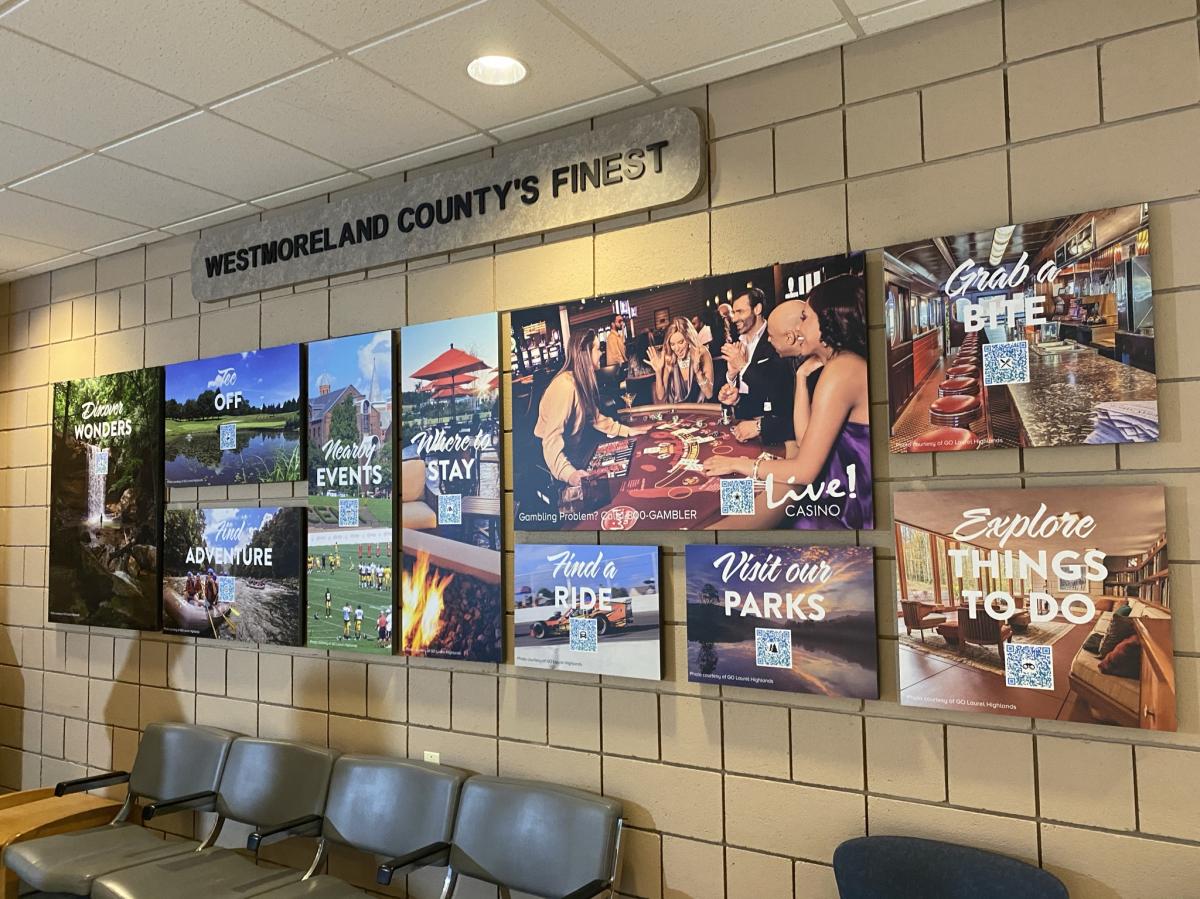 Handy Resource Wall with scannable QR codes at Arnold Palmer Regional Airport