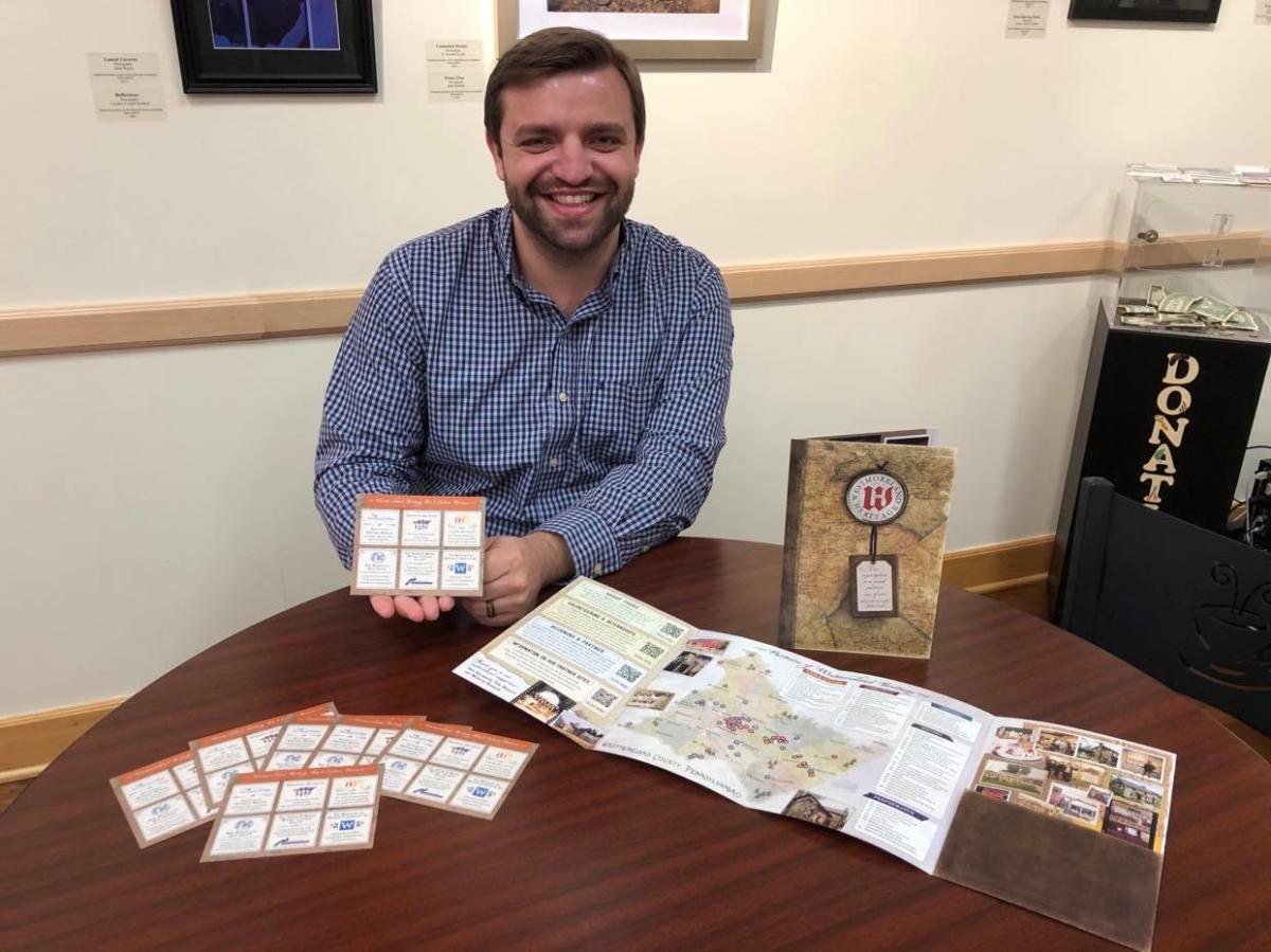 Michael Tusay at Latrobe Art Center with new Westmoreland Heritage Exploration Map and Collectibles