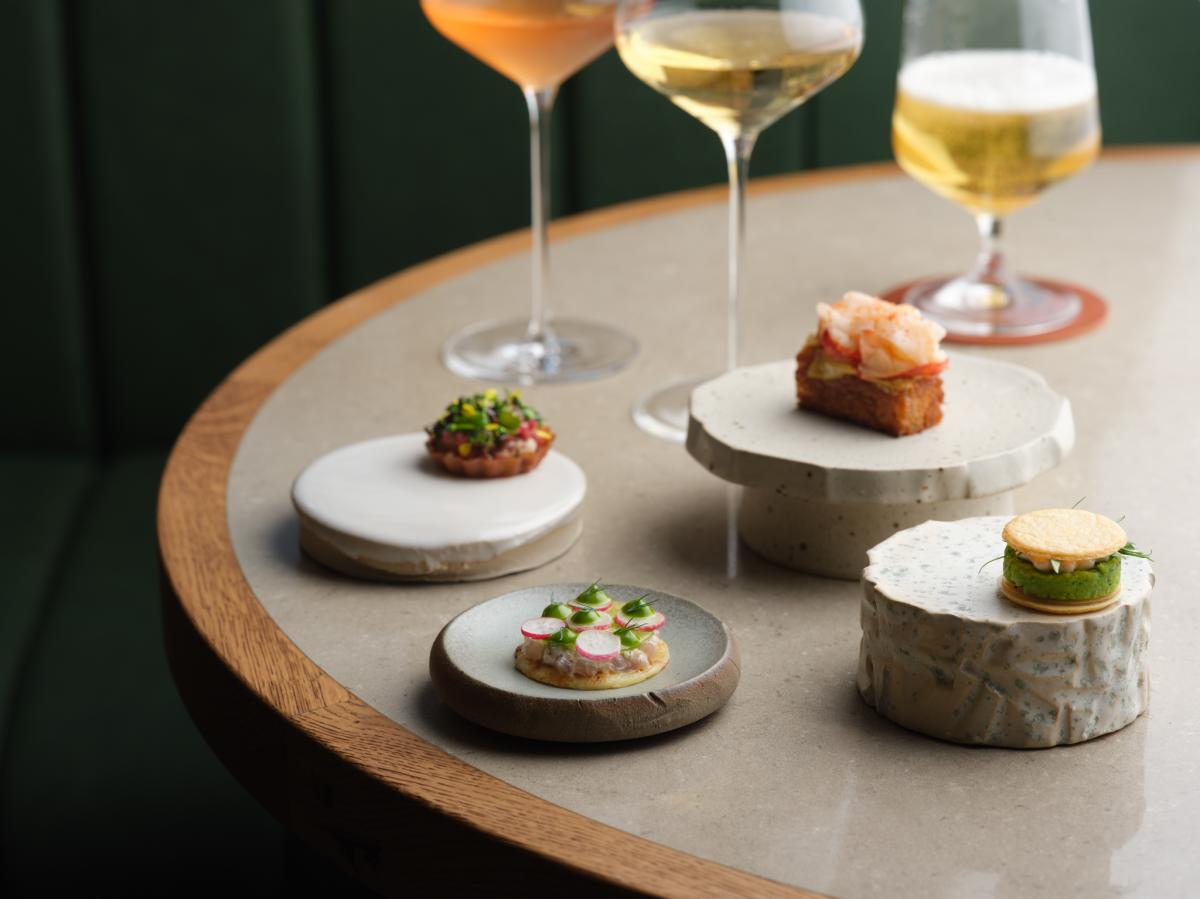 Beautifully presented table of small plates at SKOF