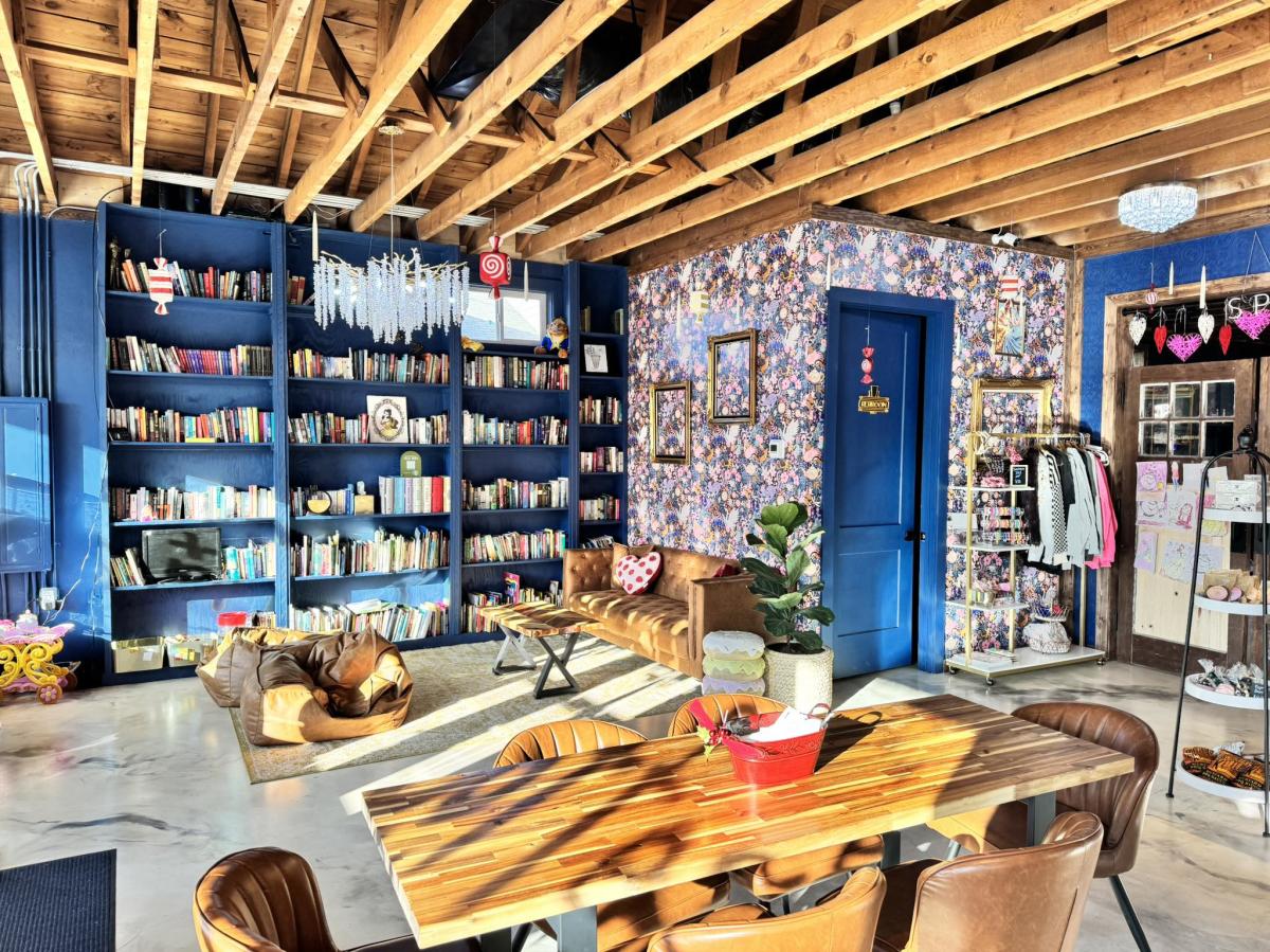 Interior view of Beauty & The Bean coffee shop and little library