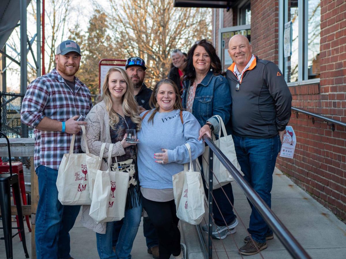 Group outside in downtown during wine crawl