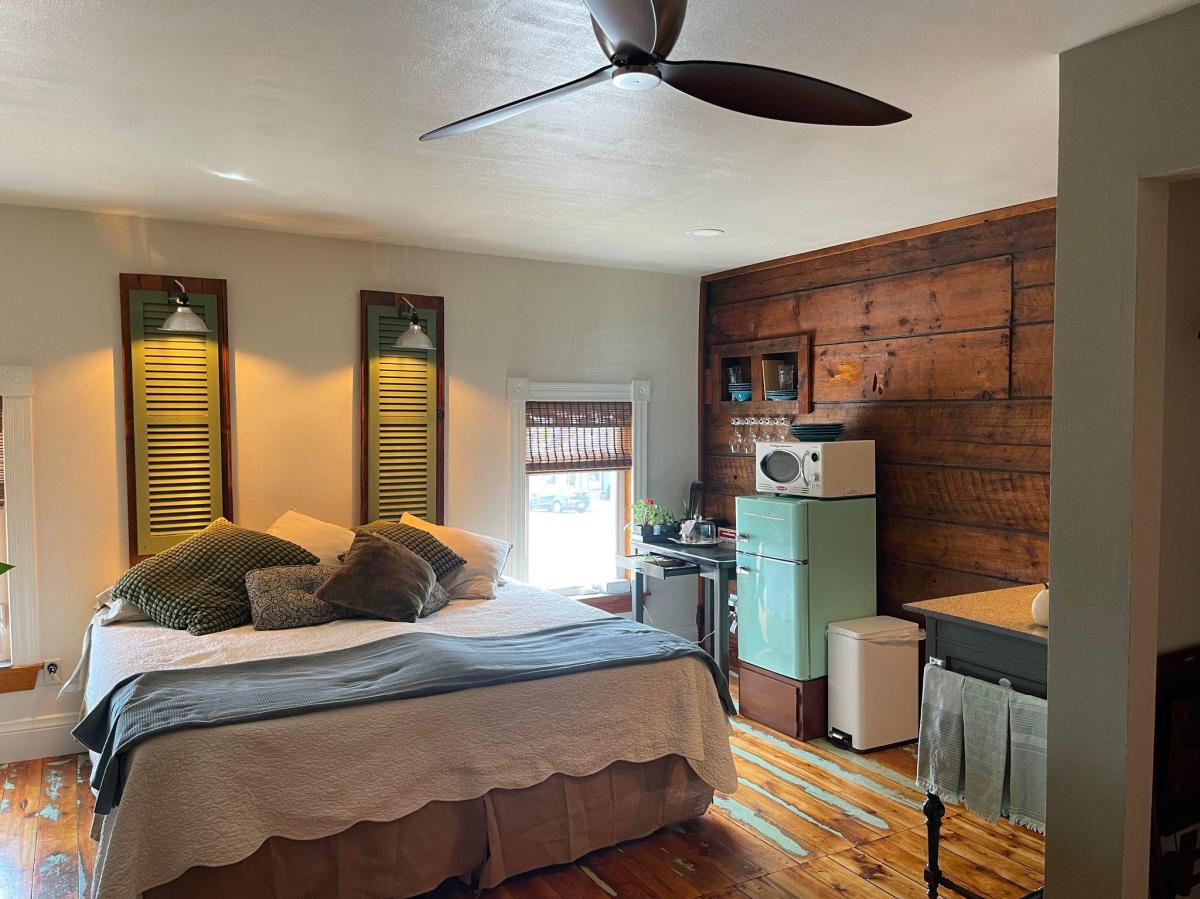 The Hive Flatlet Interior- Bedroom and Fridge
