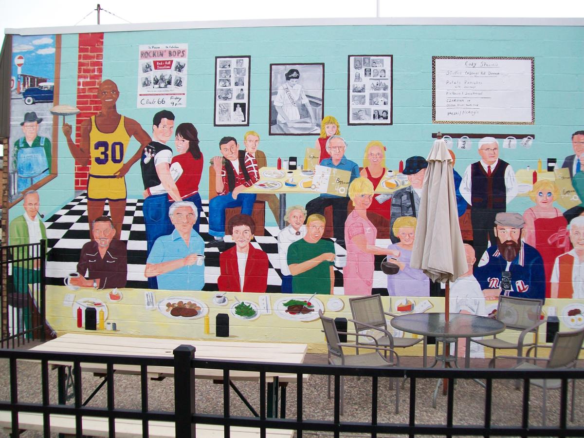 Downtown Stevens Point Mural at Cozy Kitchen, painted by local artist Greg Luedtke.