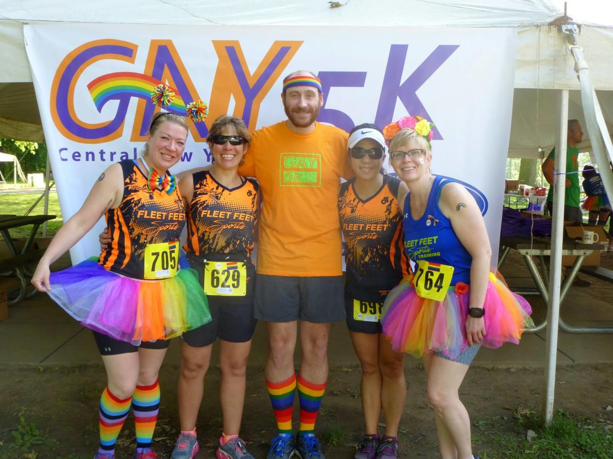 5 participants of the CNY Gay 5k taking a photo together