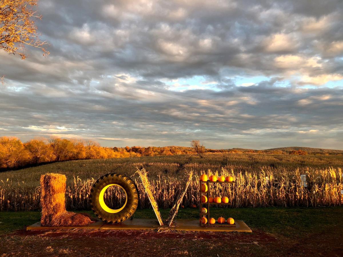 Liberty Mill Farm's LOVEwork, made from hay, a tire, and pumpkins