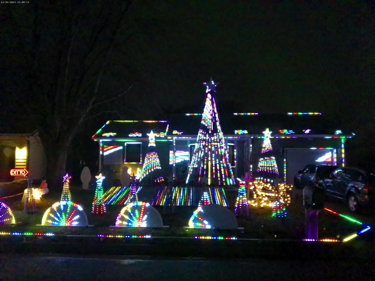 Lights illuminate a home at Christmas on Brummett St.