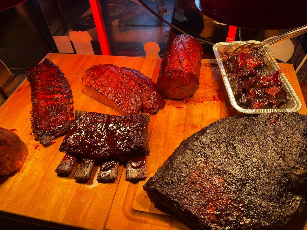 A slab of ribs and brisket sit on a cutting board at Station 8 Barbecue near downtown Wichita