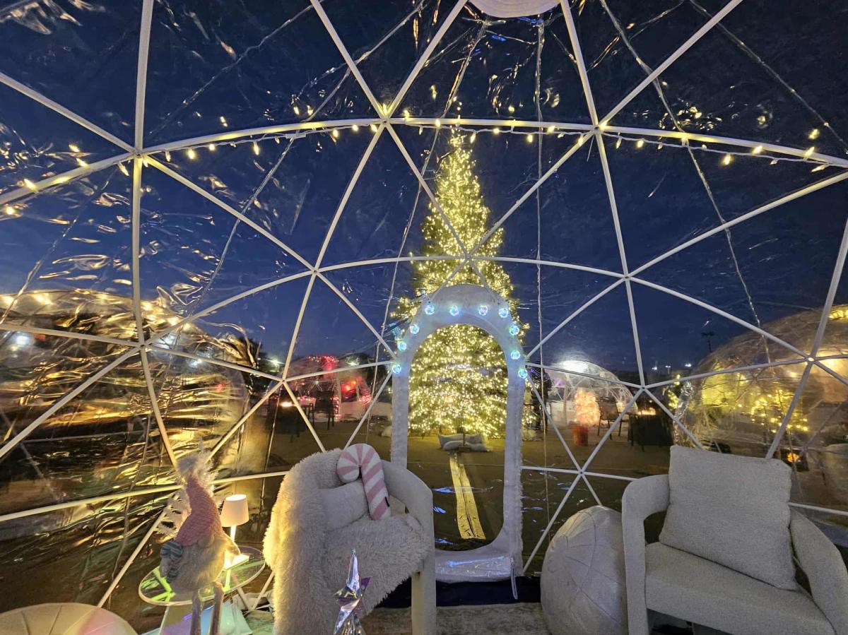 An igloo is decorated at Somewhere in Winter holiday festival