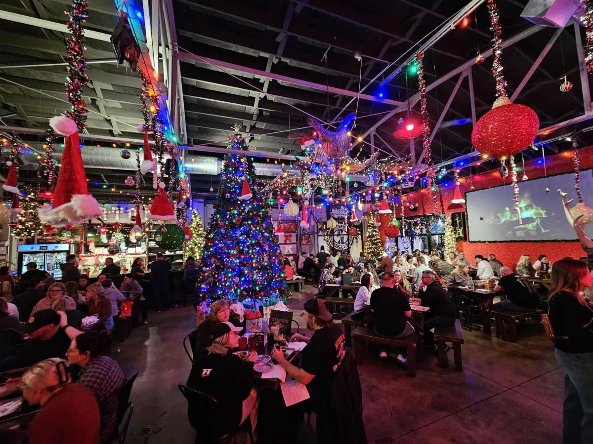 People enjoy a festive holiday pop-up bar at NOrtons