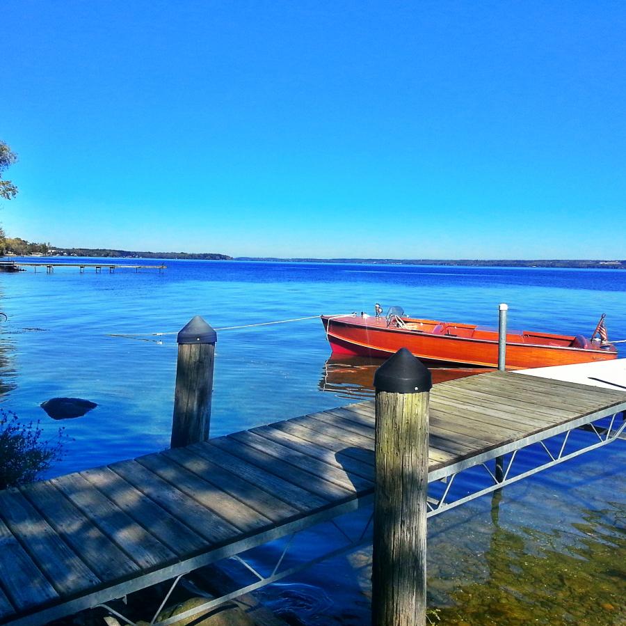 Dock with tied up boat on Cayuga Lake