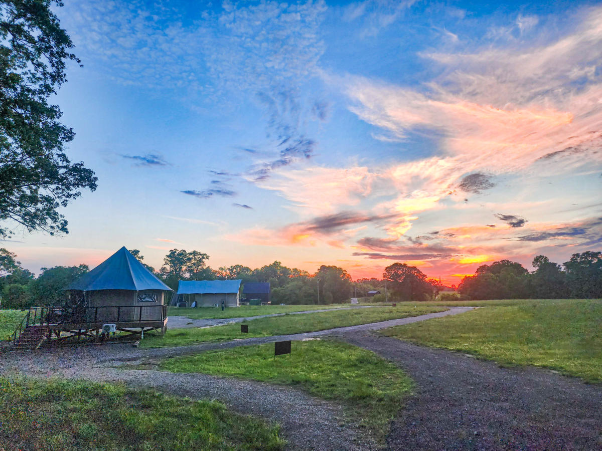Clouds reflecting the sun setting over Strlight Haven.
