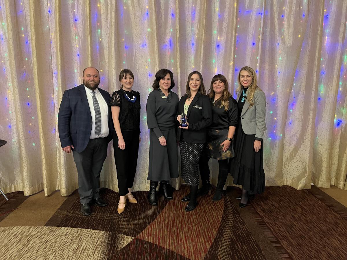 Members of Visit Albuquerque accept the TopHAT Award for Most Innovative Campaign.