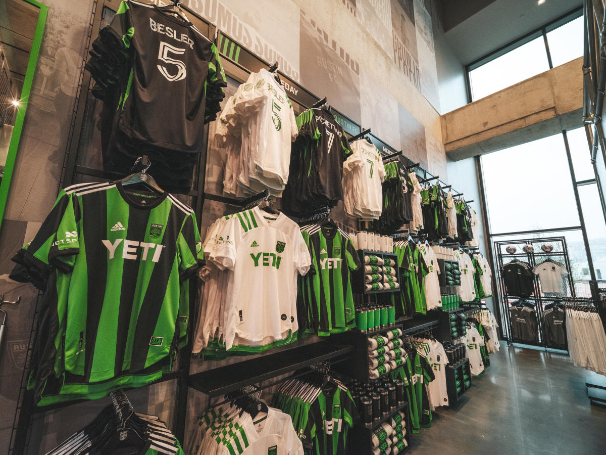 Austin FC jerseys on the wall at the Verde Store inside Q2 Stadium