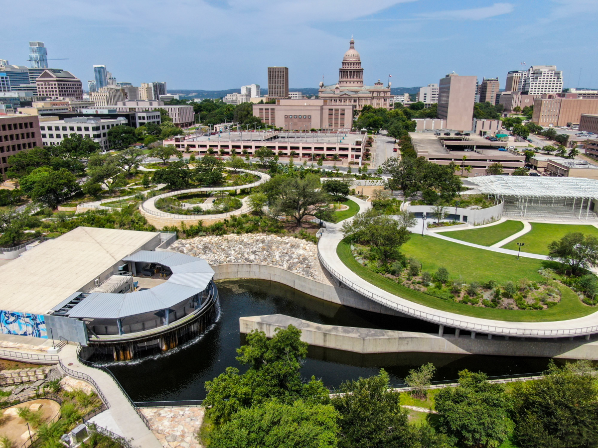 Aerial view of Waterloo Park including Waller Creek and the downtown skyline.
