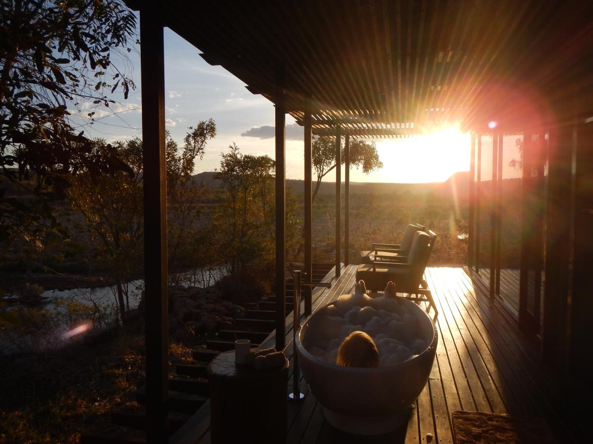 Al fresco bath on the cliffside retreats at El Questro Homestead - sunset