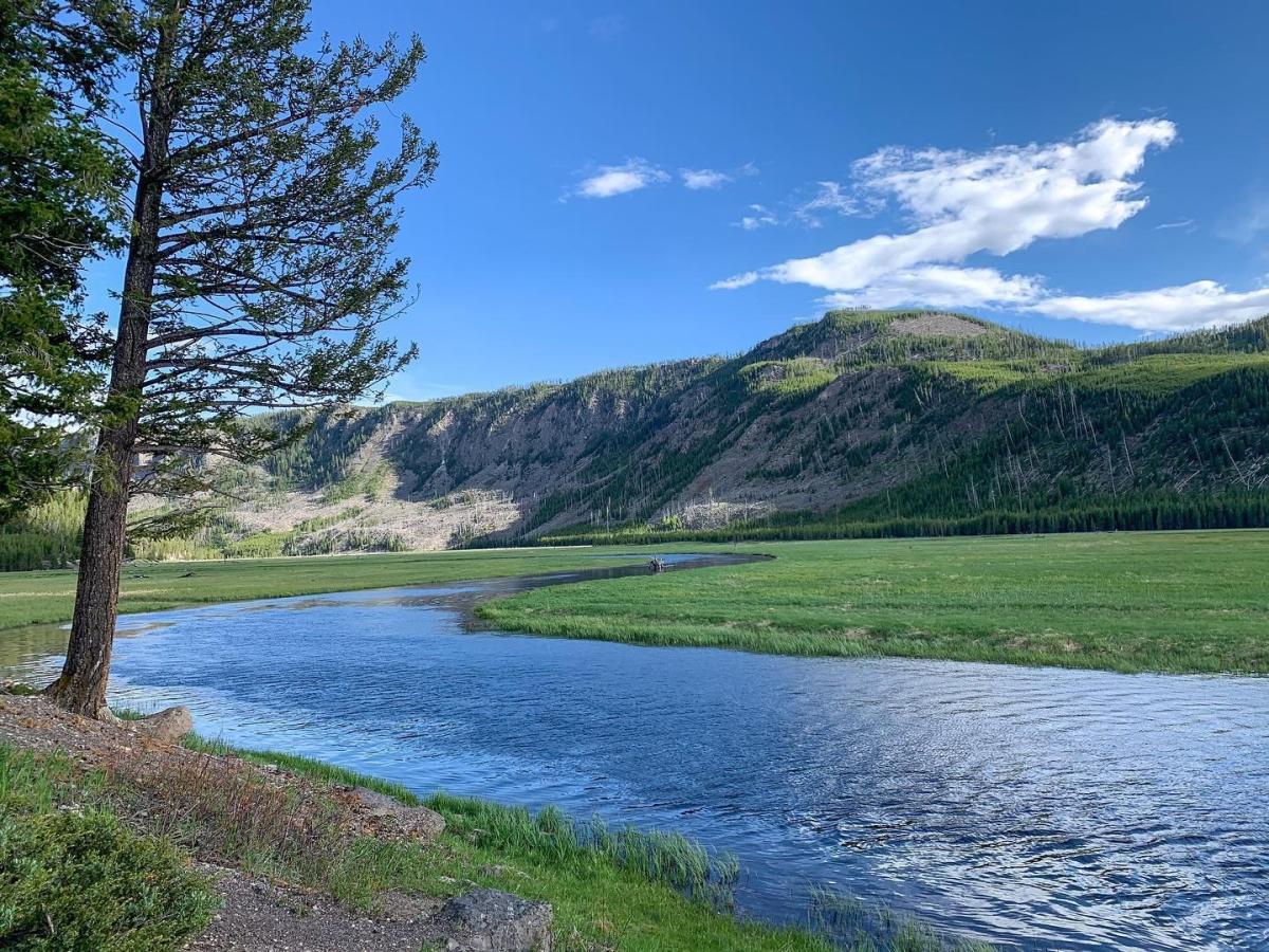 Photo by user angiekickliter, caption reads I am so grateful, so blessed, so in awe at the beauty of this magical place. The Madison River and Mount Hayes along the West Entrance Road. #yellowstonenationalpark #madiaonriver #yellowstone  #fulltimerv #fulltimervliving #fulltimervlife #fulltimervers #fulltimerving #rvlife