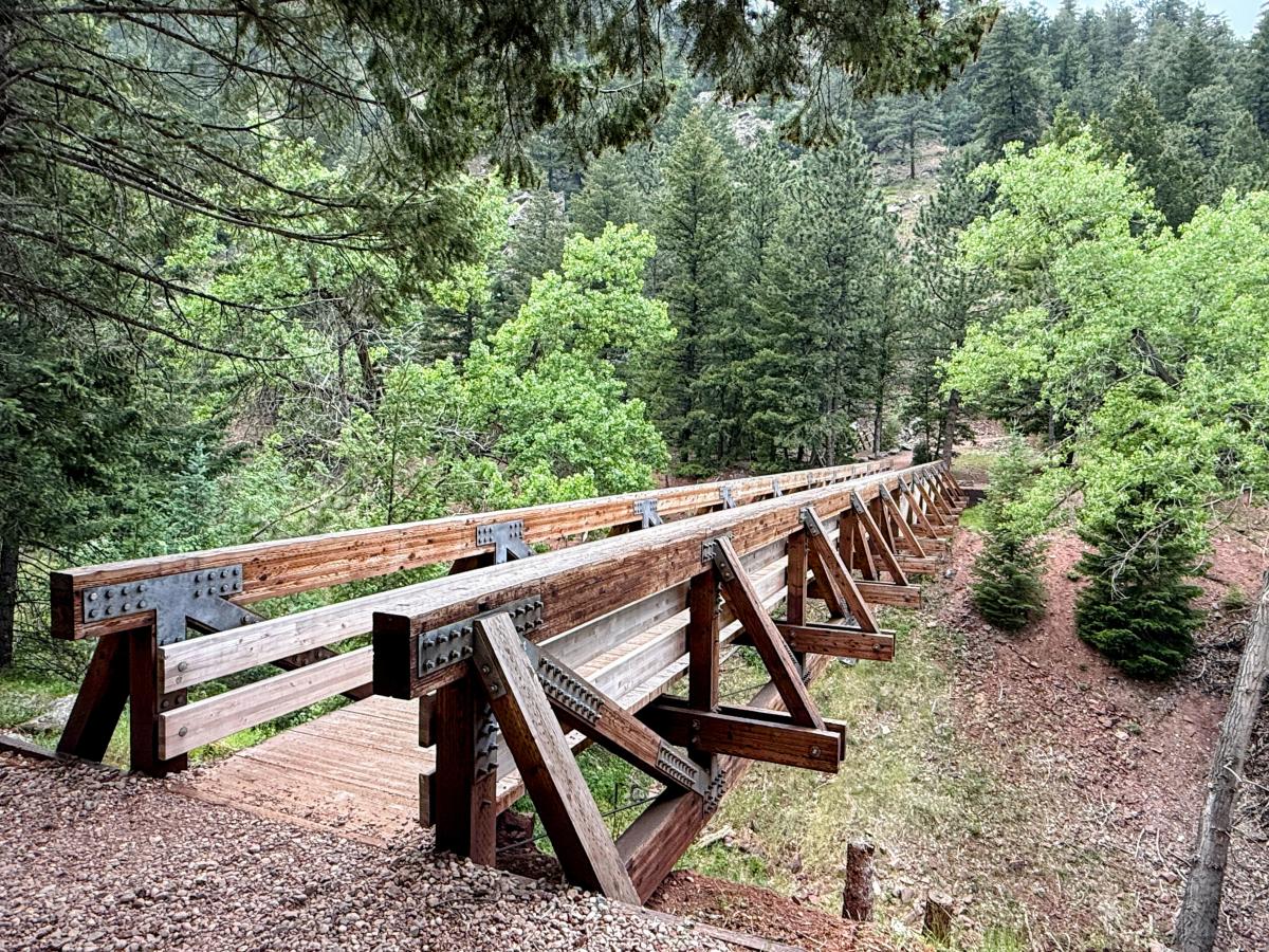 Wooden footbridge on Rattlesnake Gulch Trail in Eldorado Canyon State Park