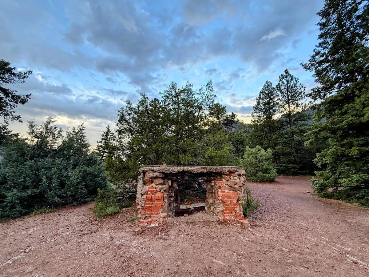 The remnants of a brick fireplace or stove that were once part of Crags Hotel in Eldorado Canyon State Park