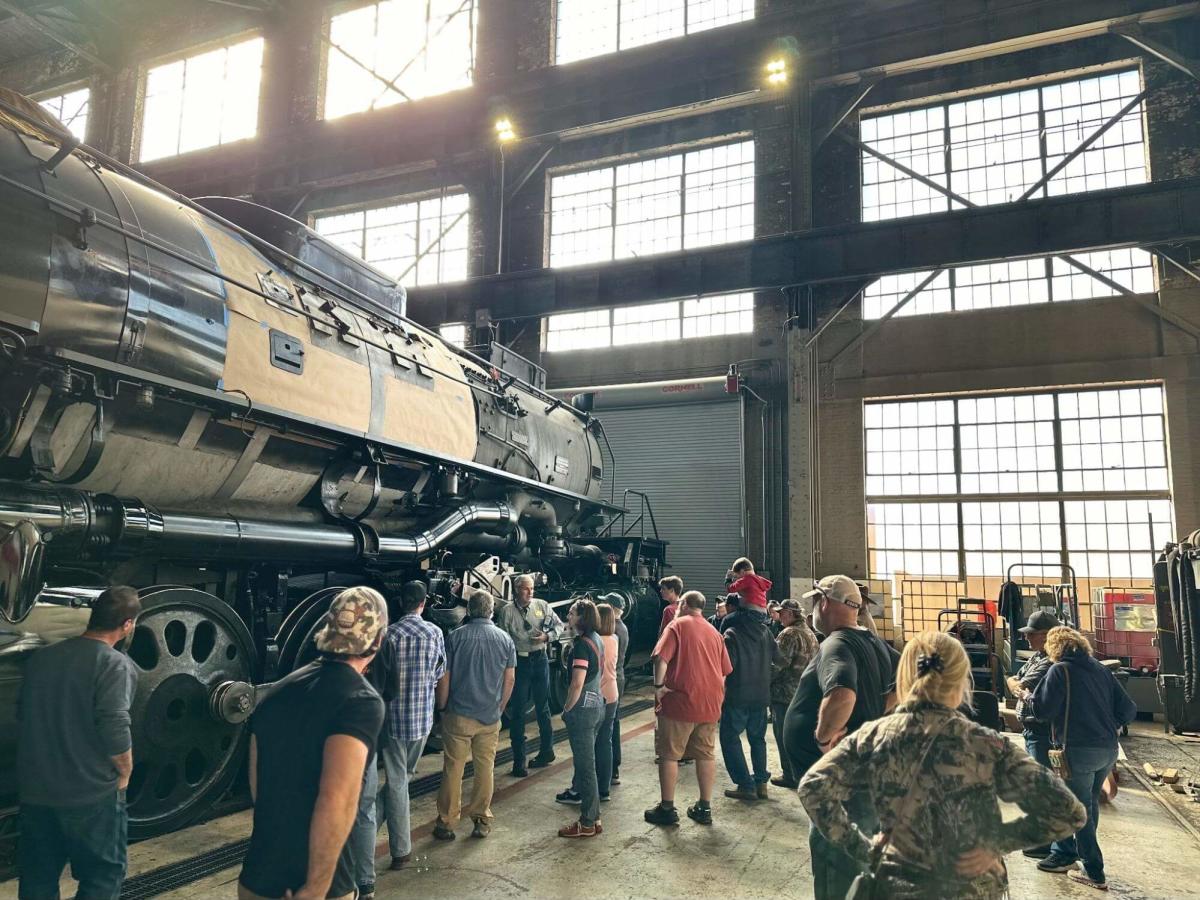 Tourists observing the Union Pacific Big Boy 4014, the world's biggest train engine.