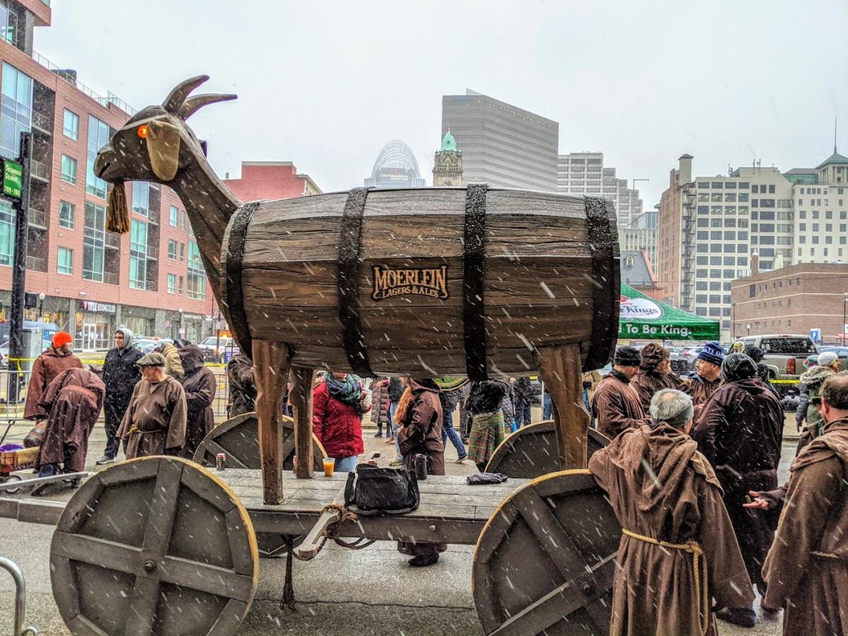 A large wooden goat with a beer barrel torso as a float in the Bockfest parade