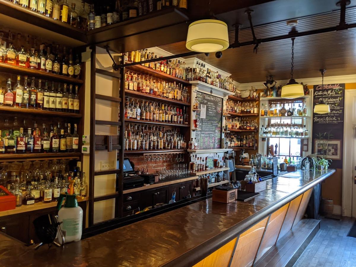 More than 700 bottles of bourbon behind the bar at Old Kentucky Bourbon Bar