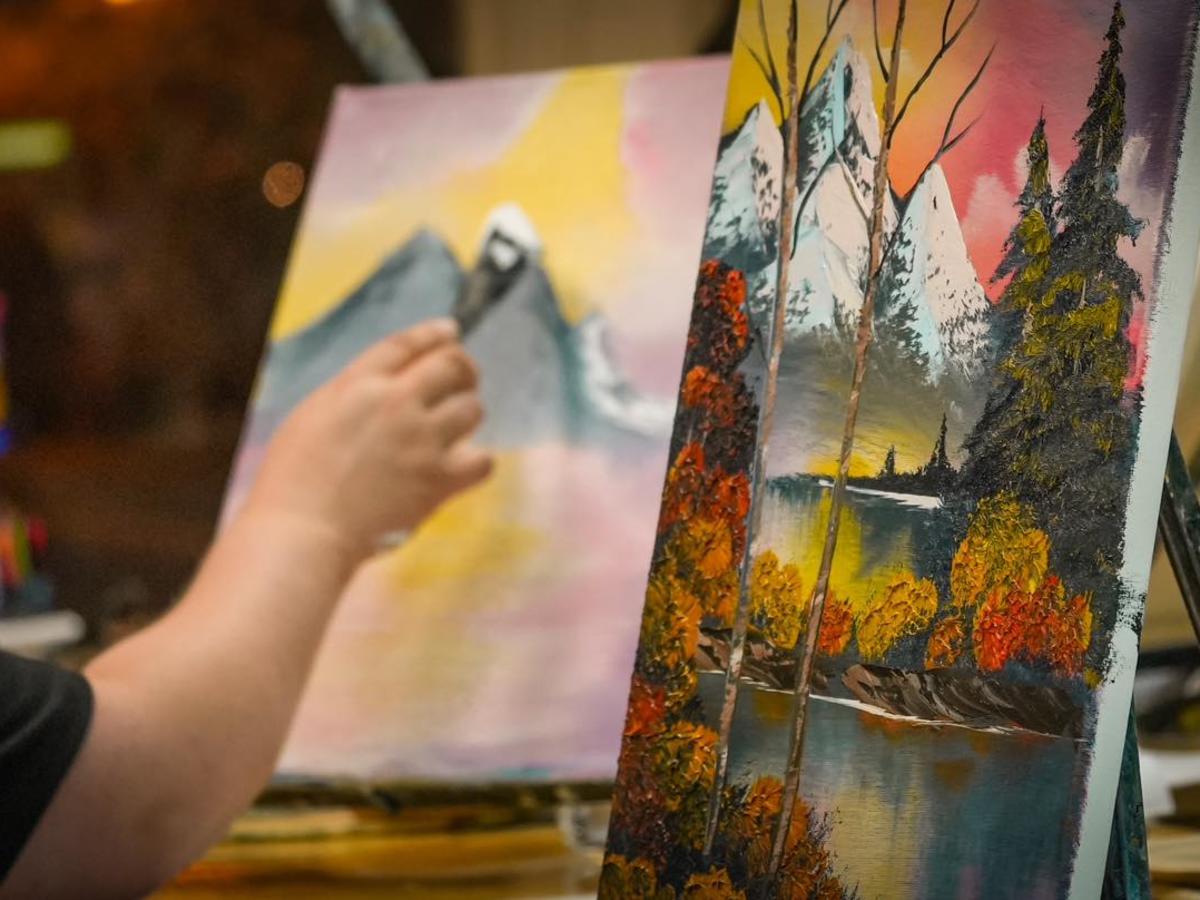 Artist painting at ArtLink studio