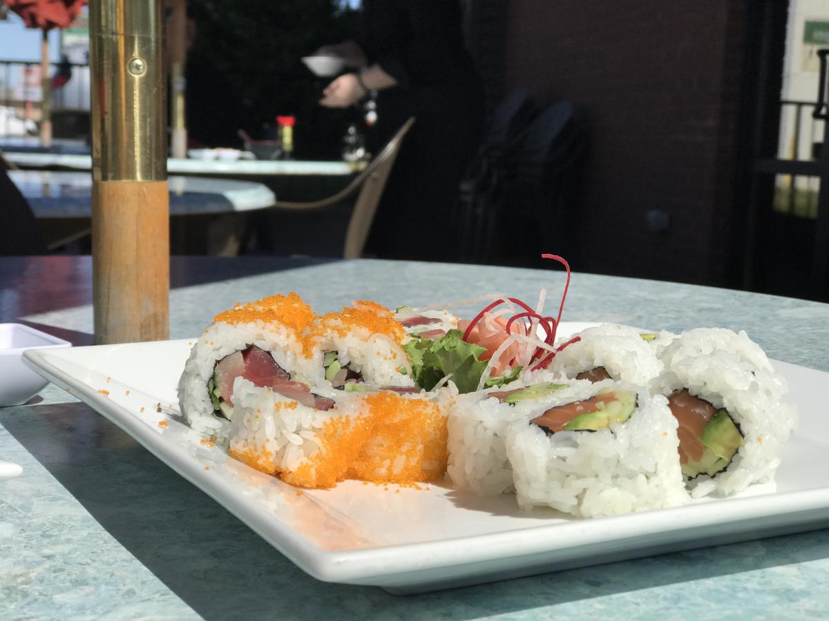 plate of sushi on an outdoor table