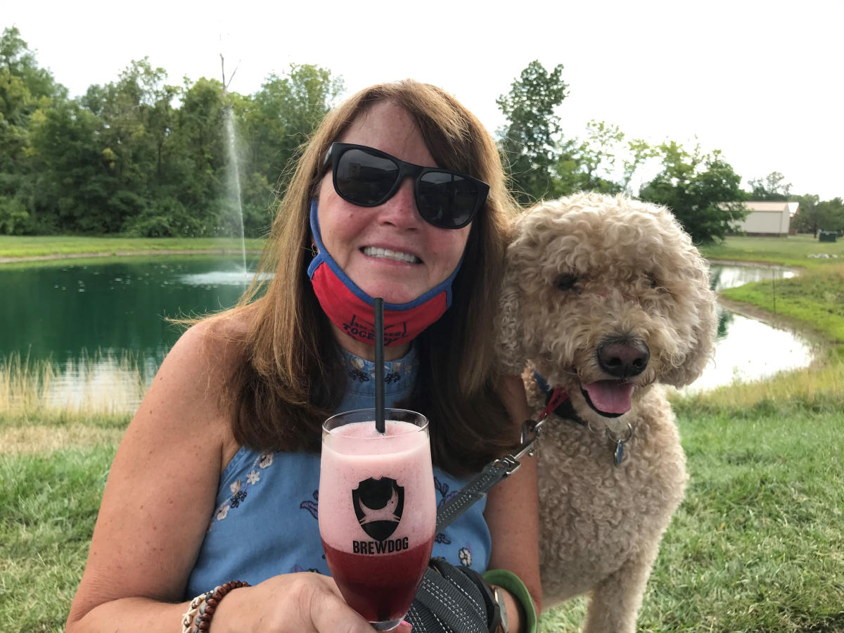 EC staffer Maureen Emoff and dog Wrigley at BrewDog