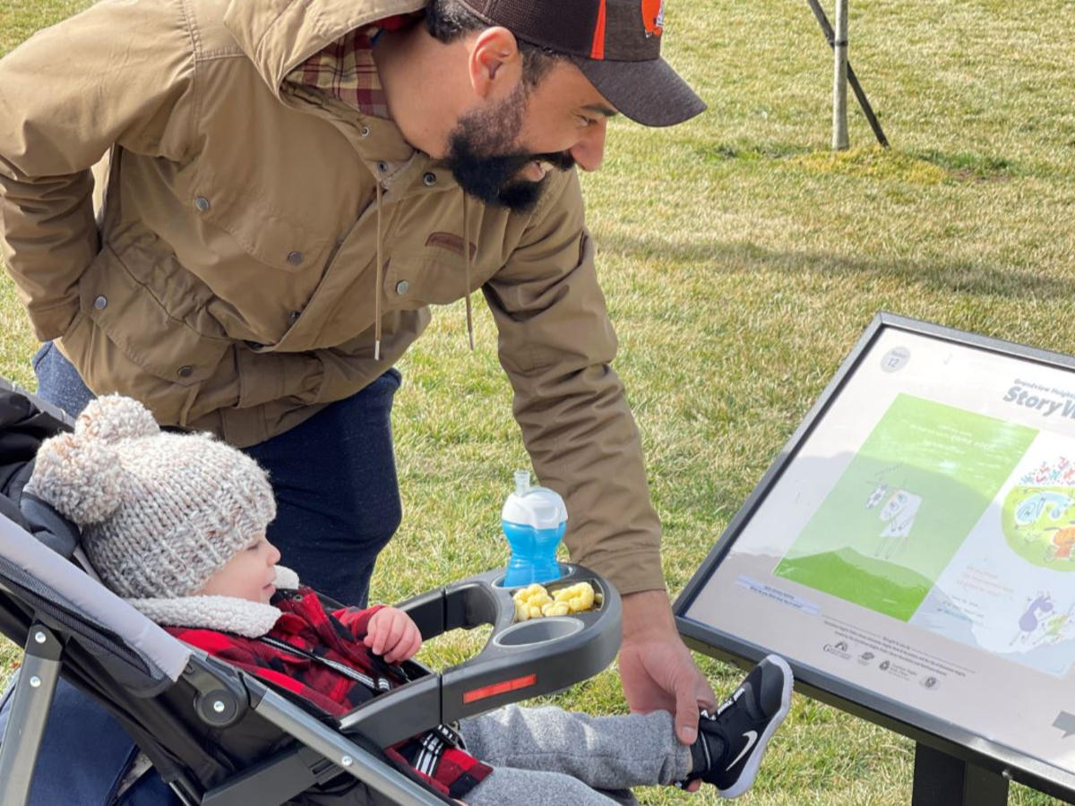 Father and son enjoy story trail