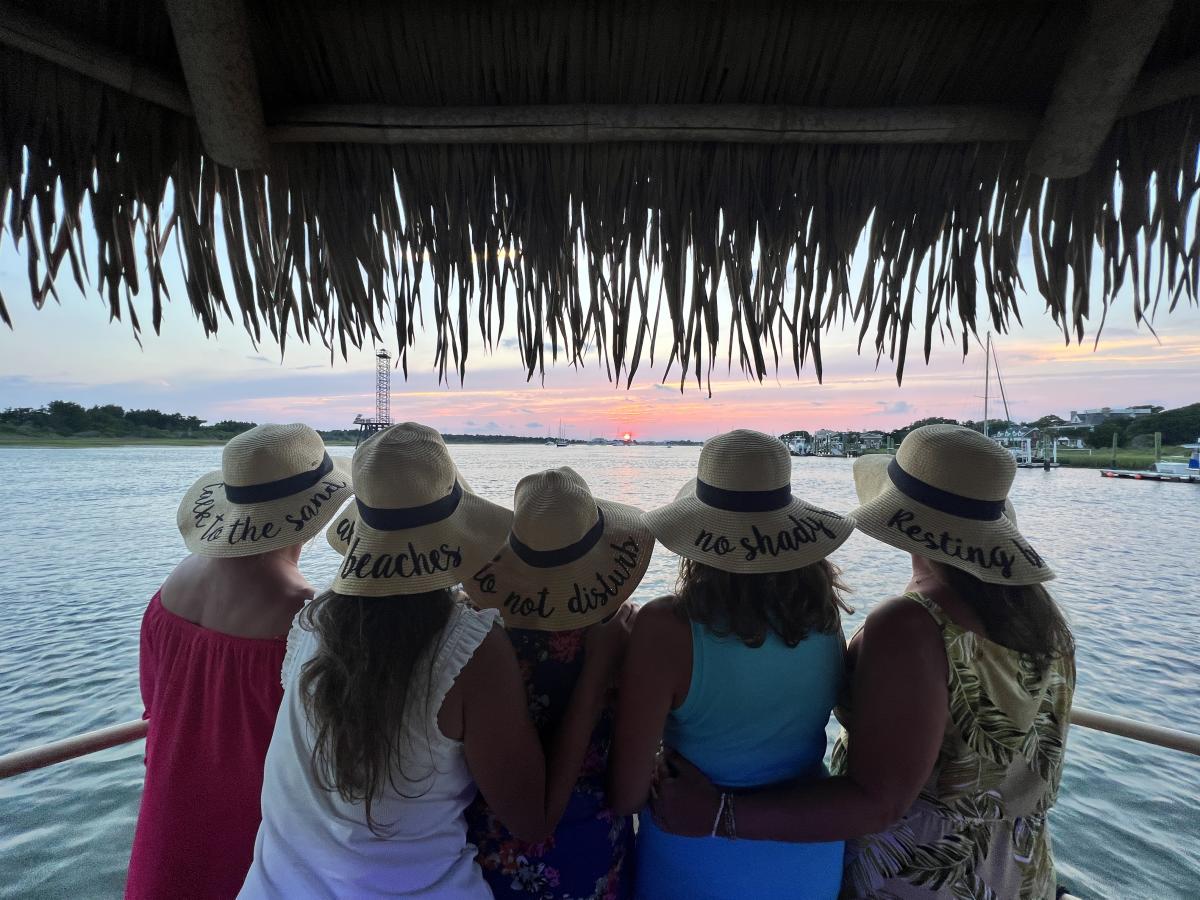 Hats on to the Ladies at Sunset
