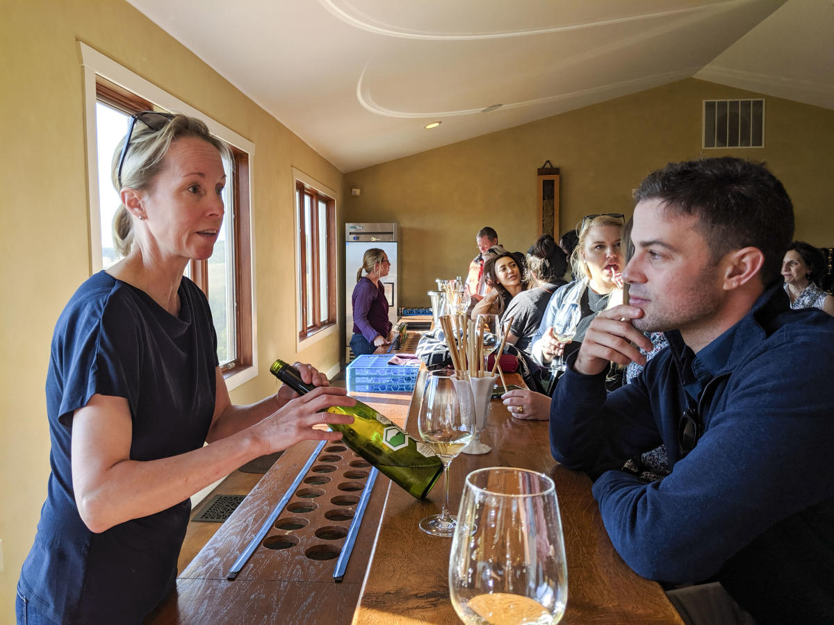 Sarah Troxell of Galen Glen Winery pours a tasting for guests at the winery in Andreas, PA.