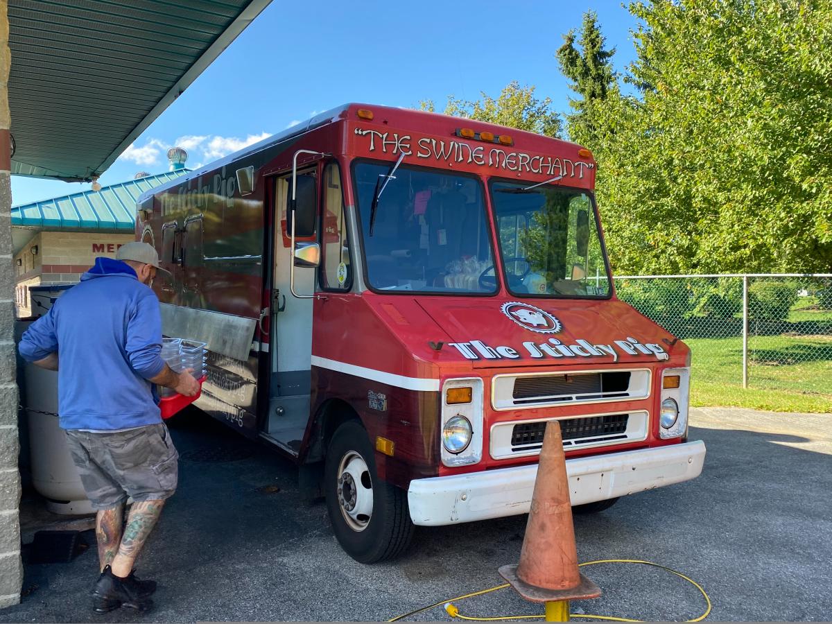 Chef arrives to the Sticky Pig Food Truck at Valley Preferred Cycling Center in Breinigsville, Pa.