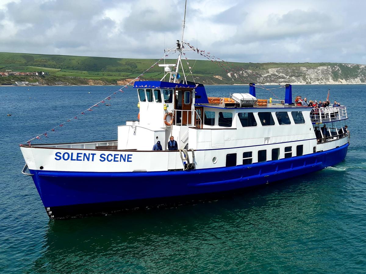 Solent Scene cruising along coastline in Swanage Bay