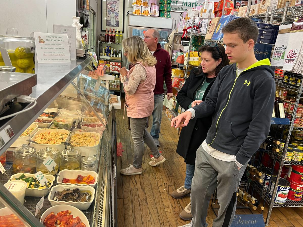 E. 48th Street Market Customers Selecting Food