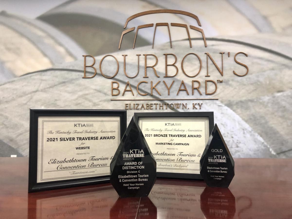 Etown Tourism's four traverse awards they won at the annual Kentucky Travel Industry Association Conference