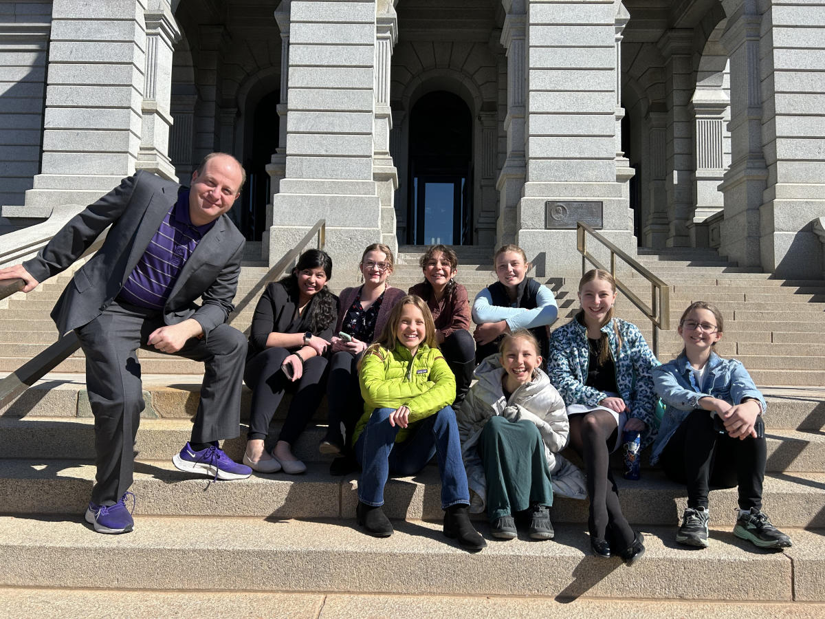 estes park middle school resilience team meets Governor Polis