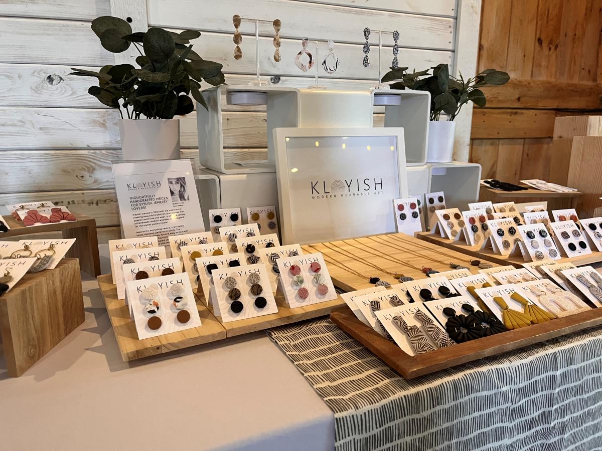 Table filled with jewelry items including earrings and necklaces