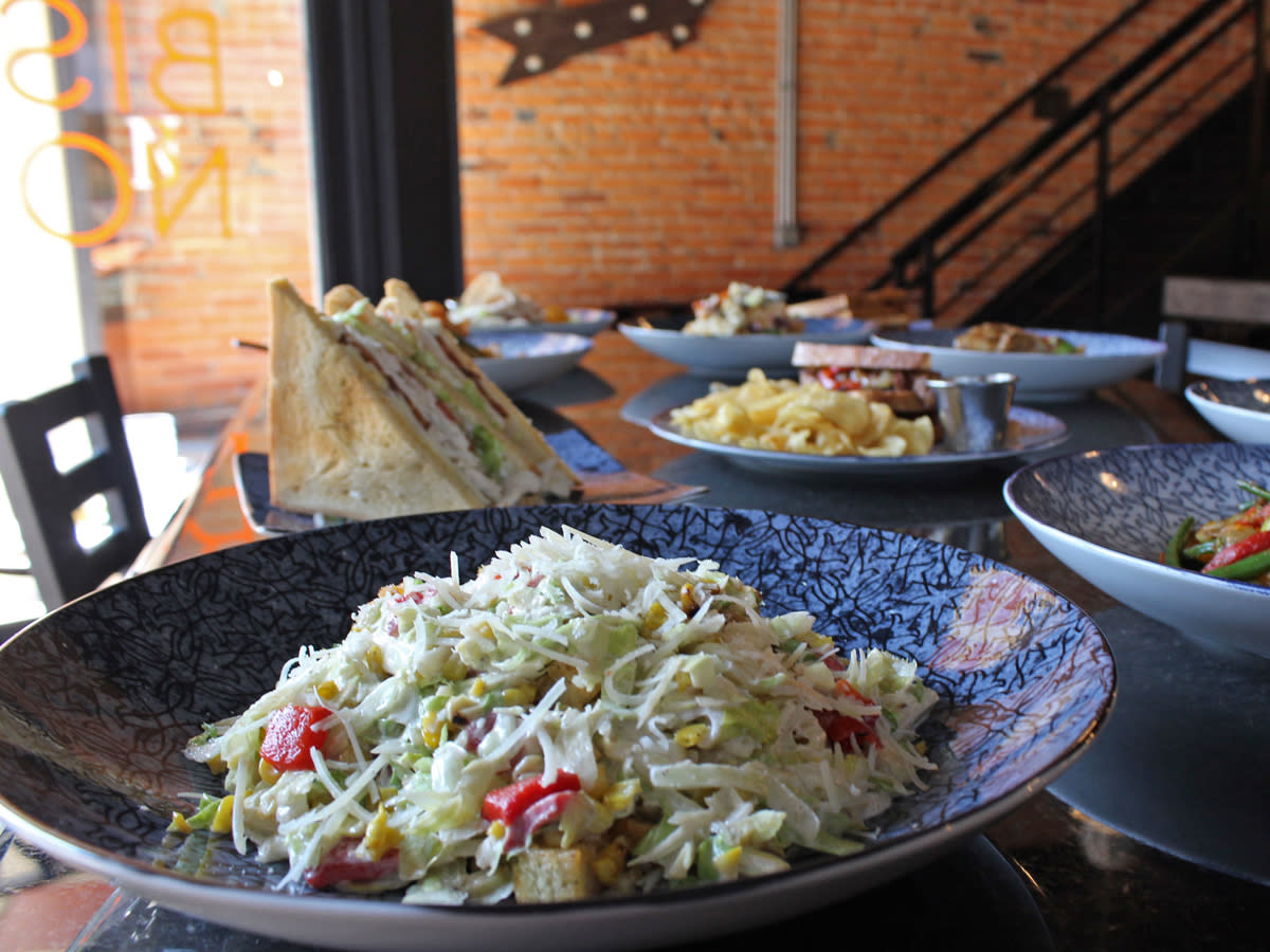 Dishes at Bistro Nota showing a chopped salad