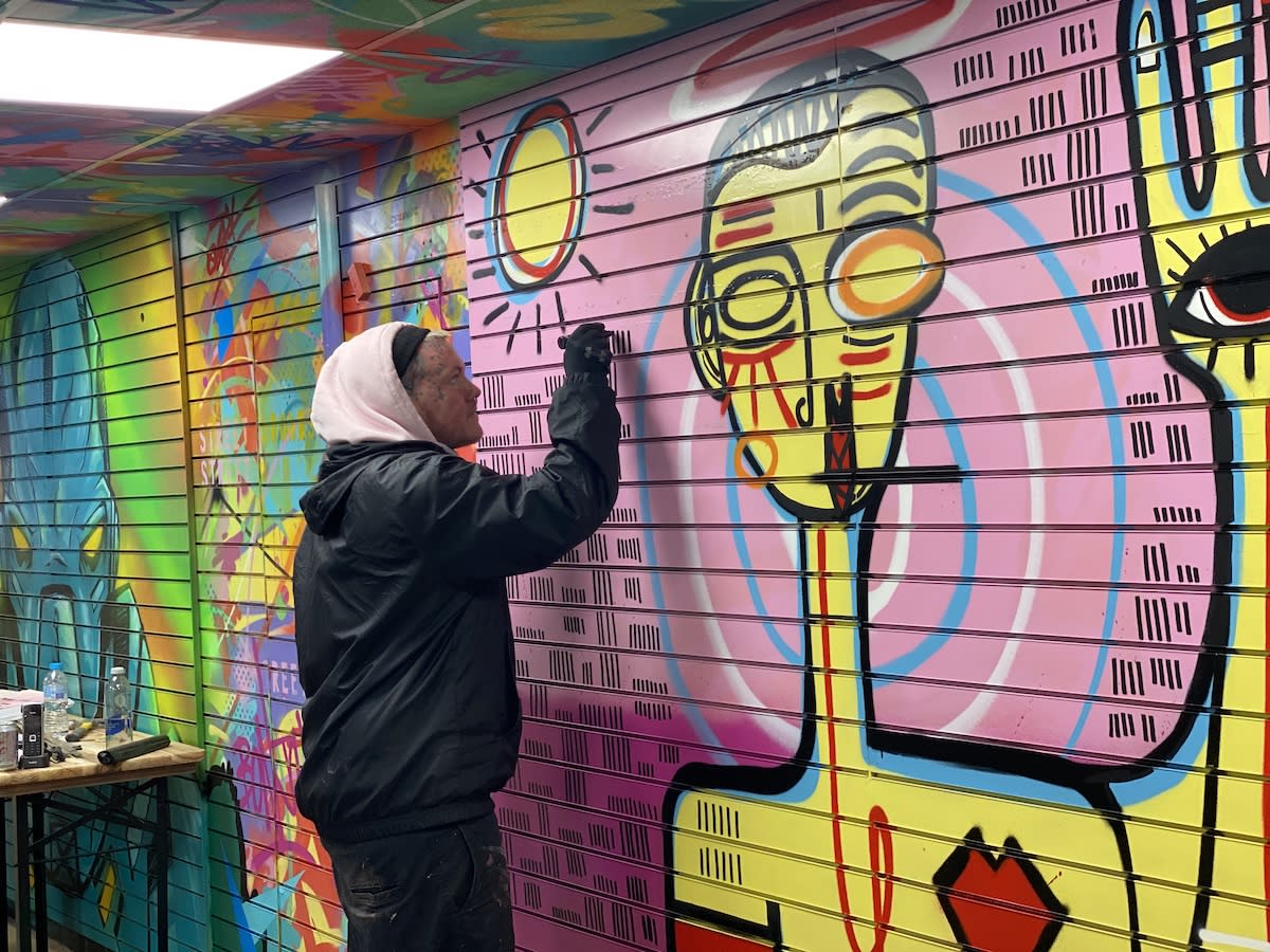 Street artist at work in Bangerz & Burgerz, Chichester