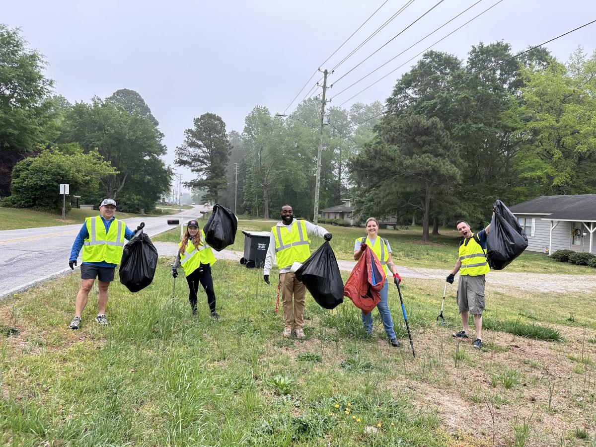 At Countywide Earth Day Clean Up Event Volunteers Pick Up Trash on Side of Road