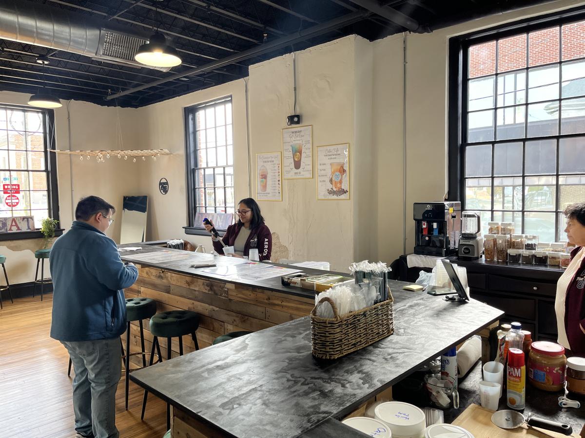 Clayton Station Tea Business with Customer