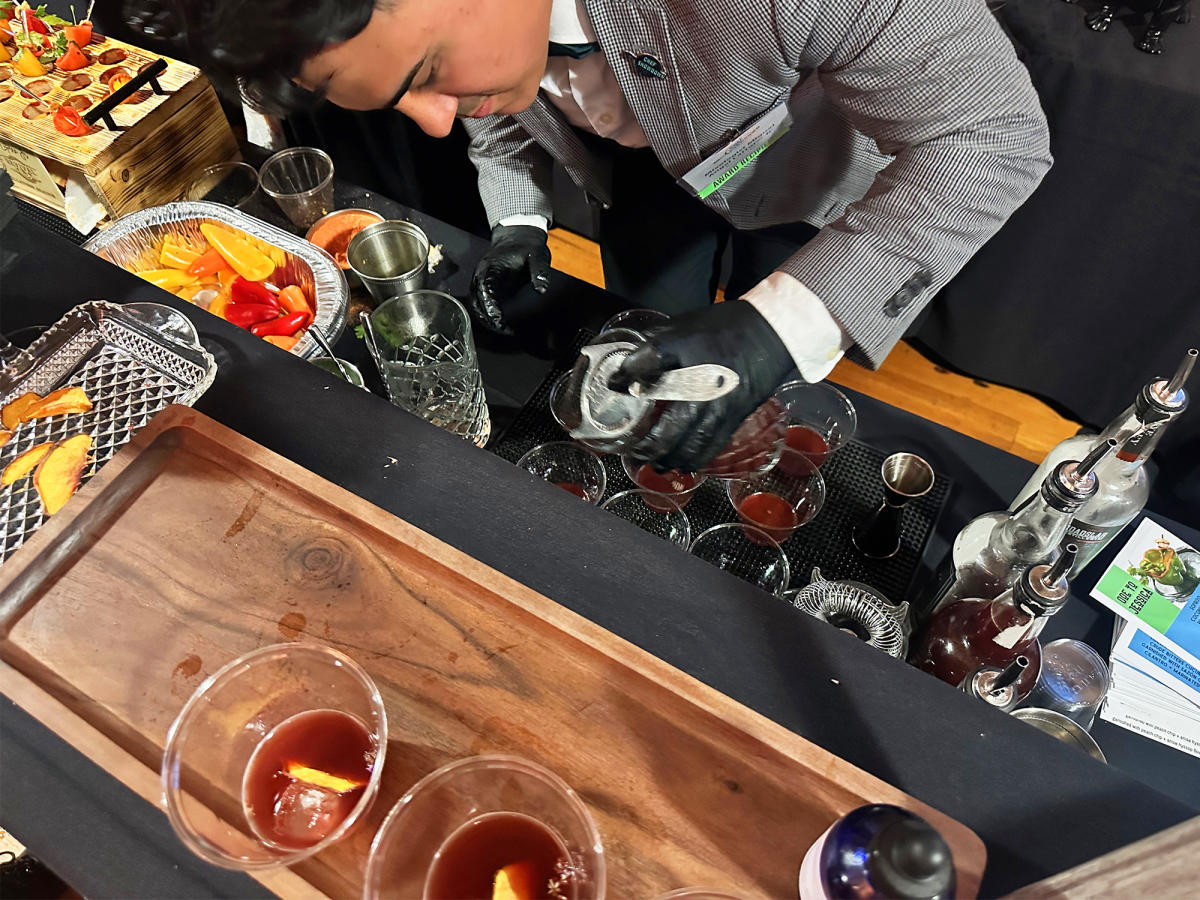 NCRLA Chef Showdown 2024 Miguel at Station Pouring Drinks