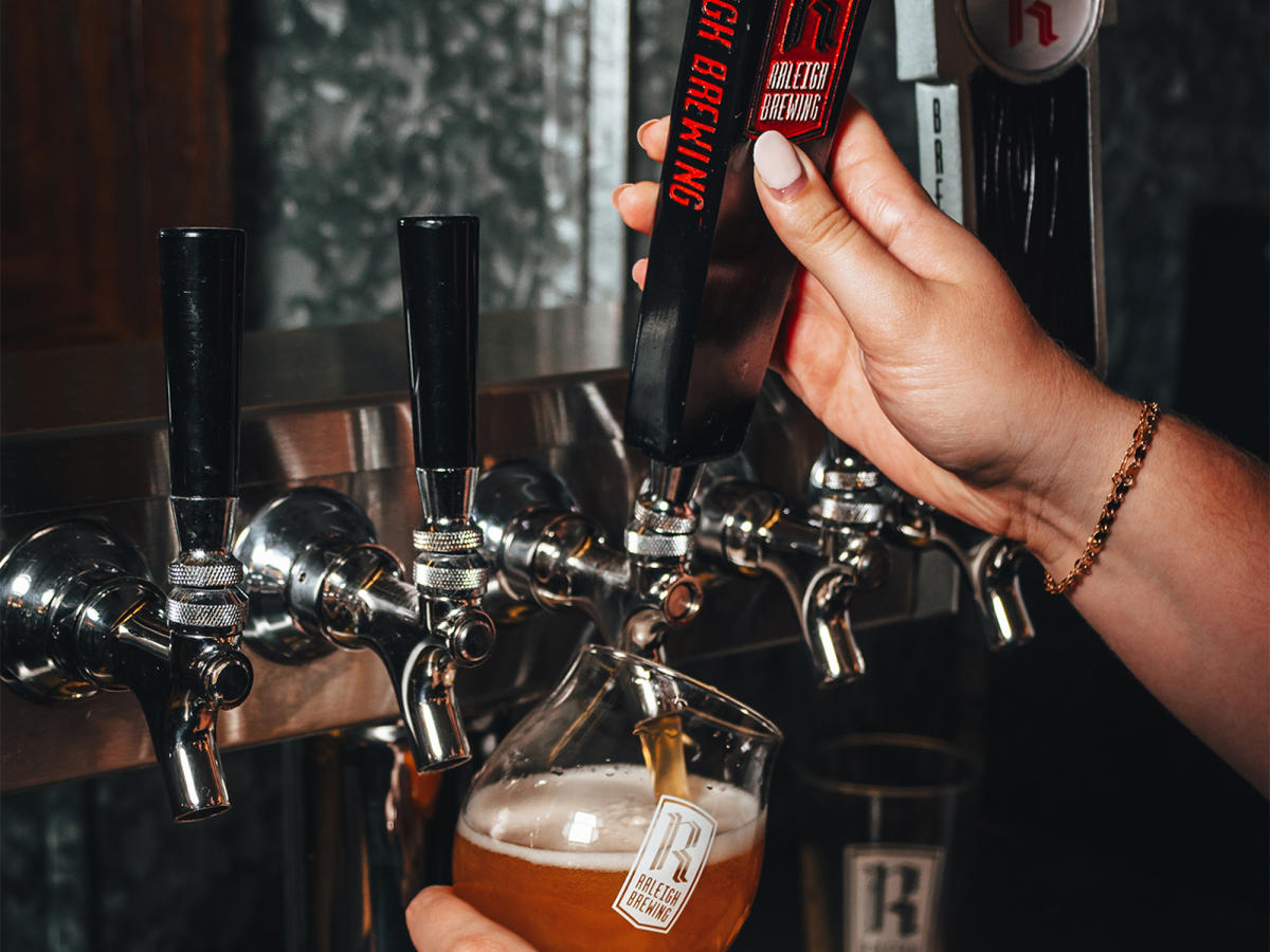 A beer being poured at Raleigh Brewing Distro in Smithfield, NC.